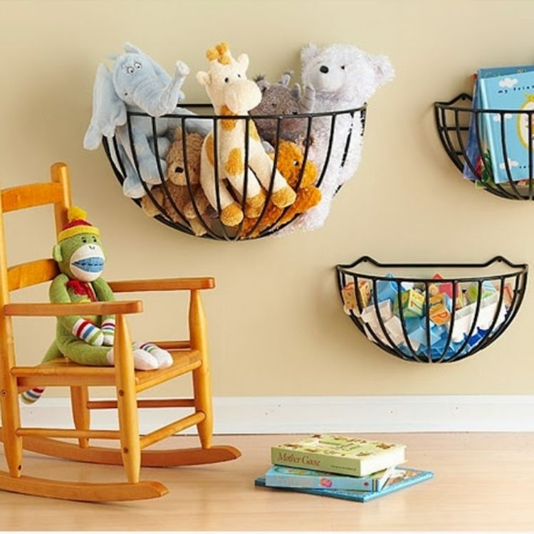 ways to organize stuffed animals using hanging baskets on the wall