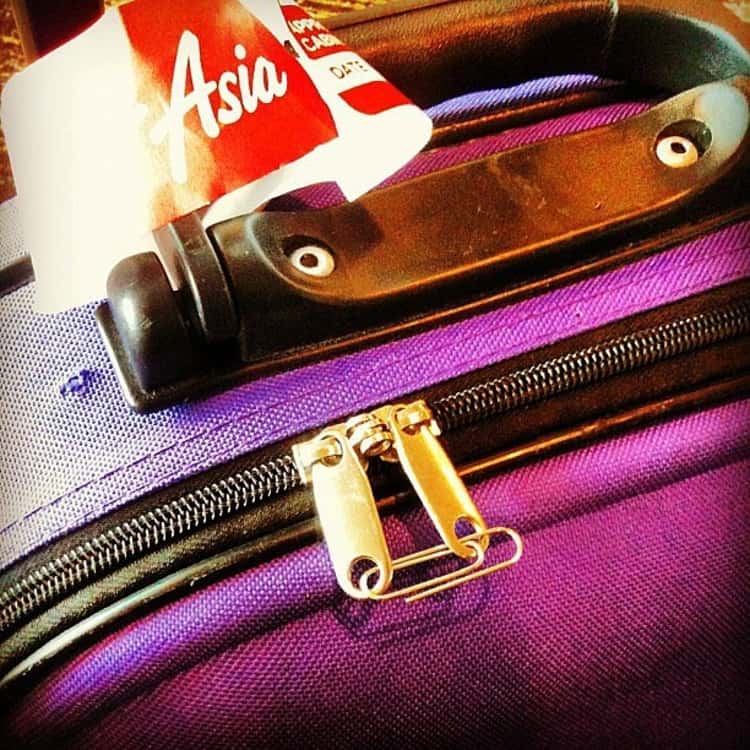 Travel tips, paper clip keeps luggage locked in a pinch, attached to both zippers.