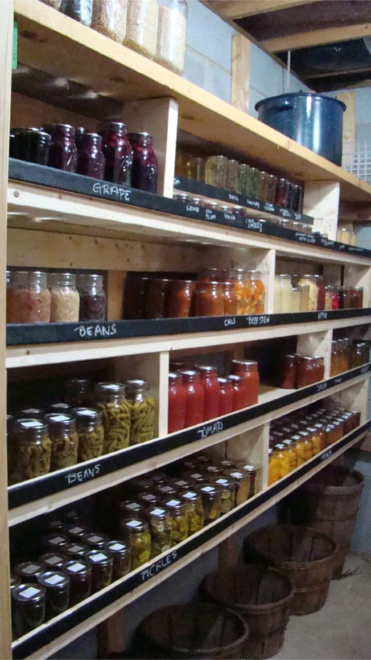 basement cans and jars storage with tags on wooden shelves