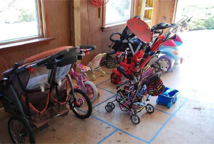 a Kiddie Parking Lot in the garage with floor marked with painters tape