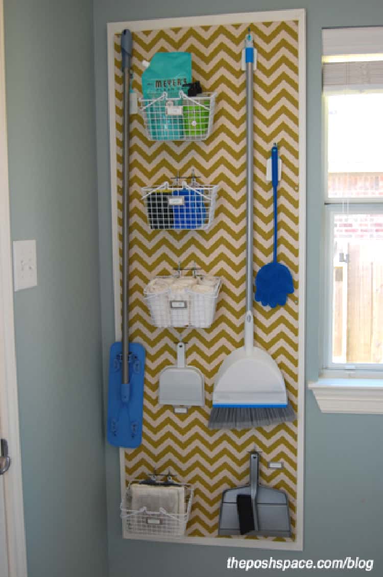 basement cleaning supplies organization on a wall-hanged pegboard