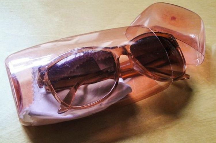 Repurposed shampoo bottle as a sunglasses case