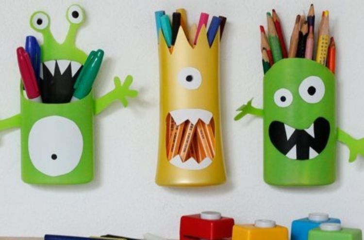 Fun and creative way to reuse your shampoo bottles as monster themed pencil holders by cutting off the tops and adding eyeballs and teeth.