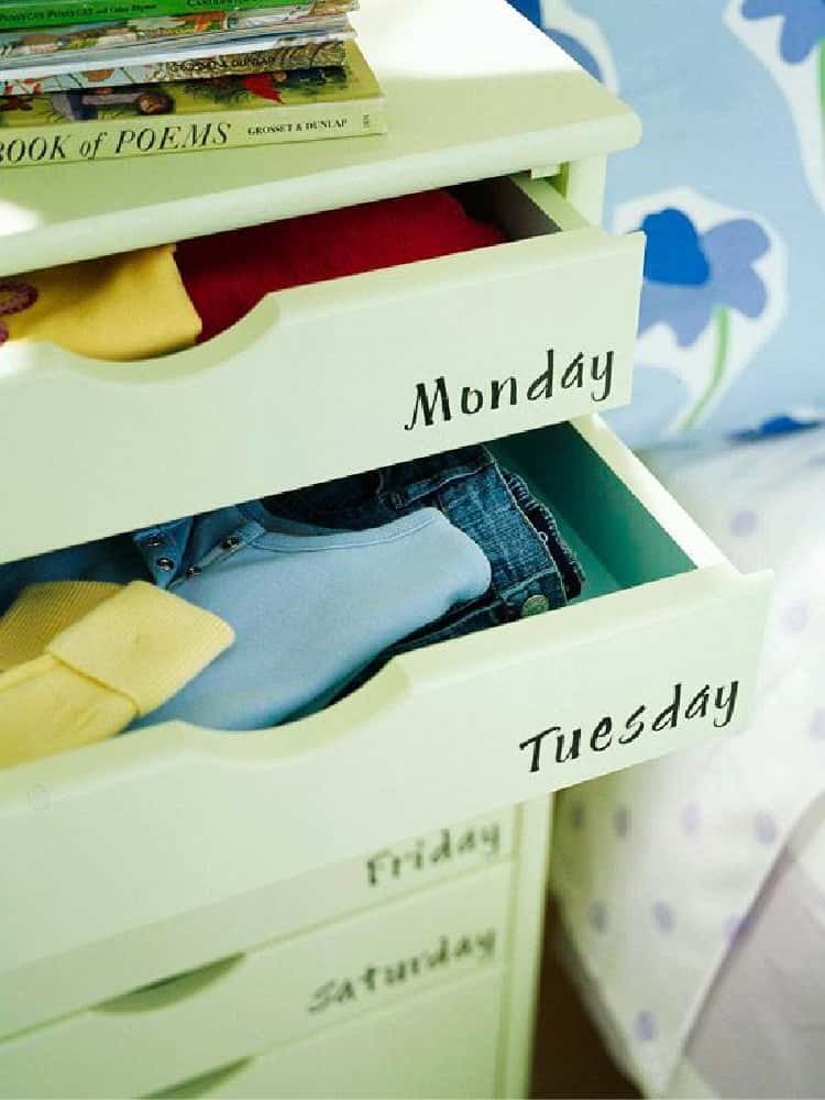 Clothing Organizer with days of the week on the drawers filled with clothes