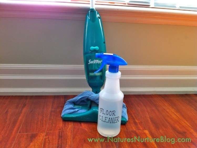 wood floor with spray bottle and mop