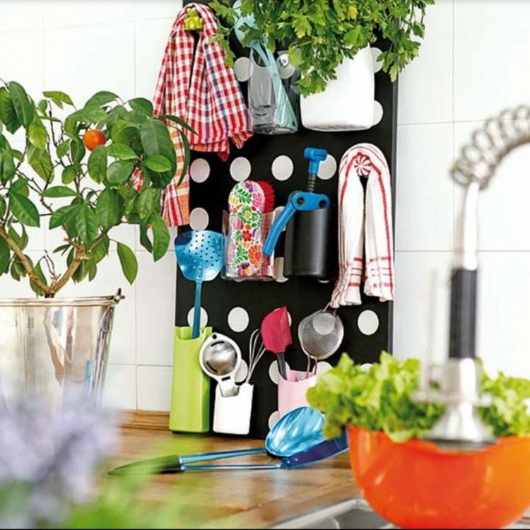 Use old lotion and shampoo bottles to create a storage or tool rack to keep all your odd little gadgets. 