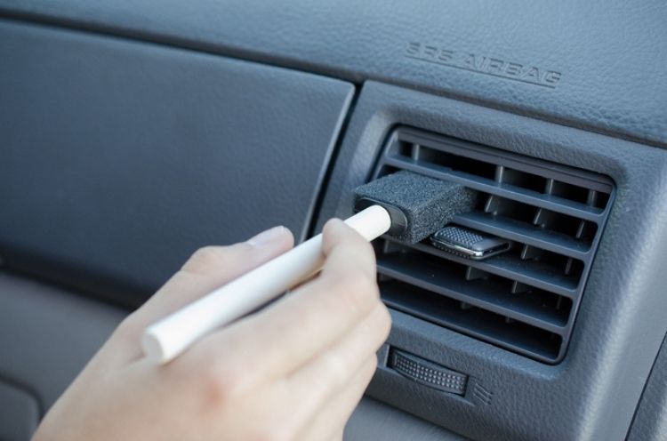 Use a painting sponge to clean all those nooks and crannies of your car. 