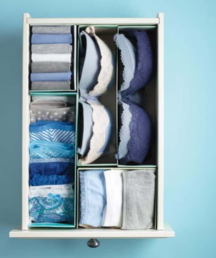 Shoeboxes used to divide drawers for lingerie