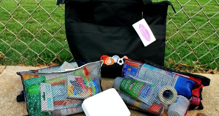 First aid supplies in a pouch for sports moms