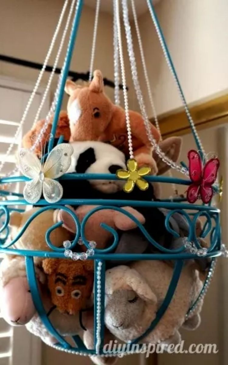 hanging flower basket with stuffed animals