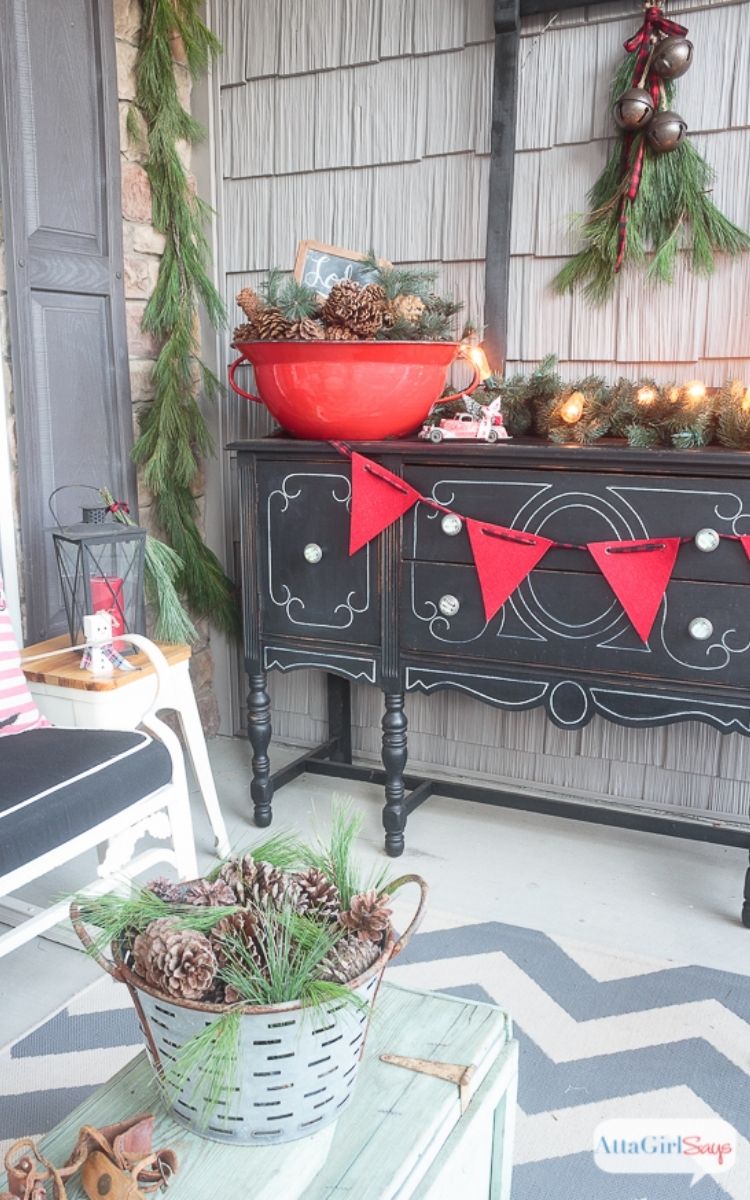 pinecones as part of front porch Christmas decor