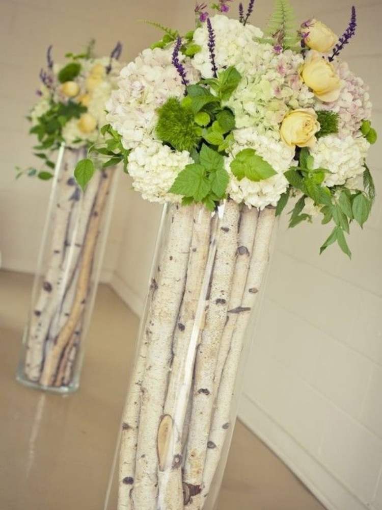Vase Filler Ideas: Picture of vase filled with tree branches and flowers