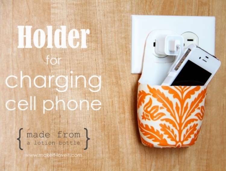 OneCrazyHouse Dorm Room Decor charging cell phone inside of a holder attached to plug on wall