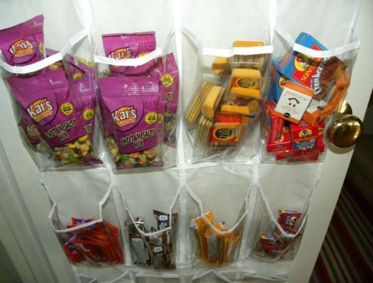 OneCrazyHouse Dorm Room Decor shoe organizer filled with snacks in each compartment