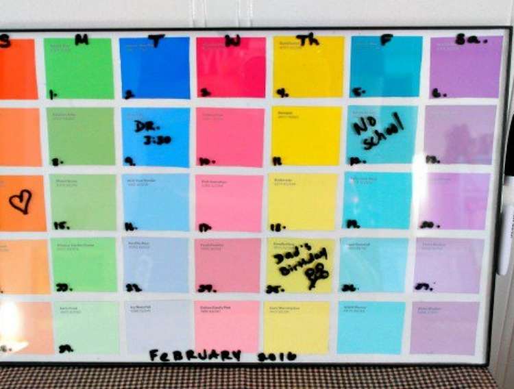 OneCrazyHouse Dorm Room Decor paint cards arranged inside of a frame used as a dry erase calendar