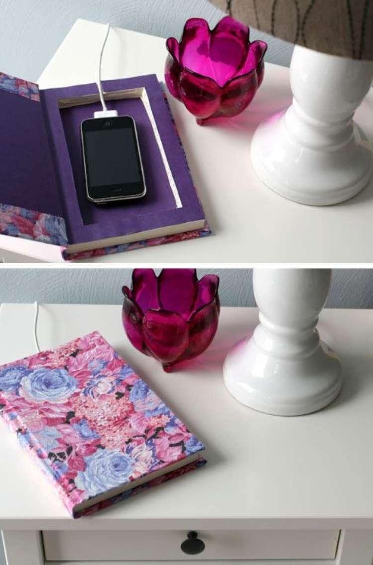 OneCrazyHouse Dorm Room Decor open book revealing compartment for charging phone, bottom shot of closed book with charger cable coming out of the back