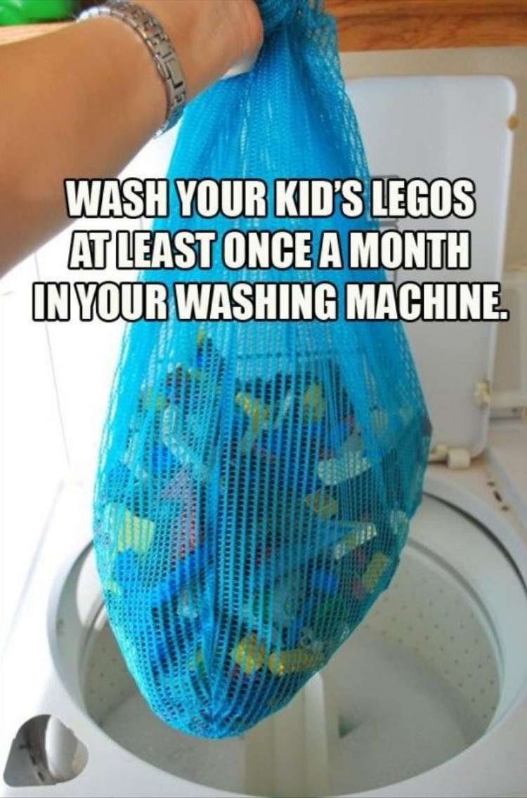 OneCrazyHouse Mesh Laundry Bags mesh bag filled with Lego Toys being held over a washer with the words "Wash you kids legos in the washing machine at least once a month"