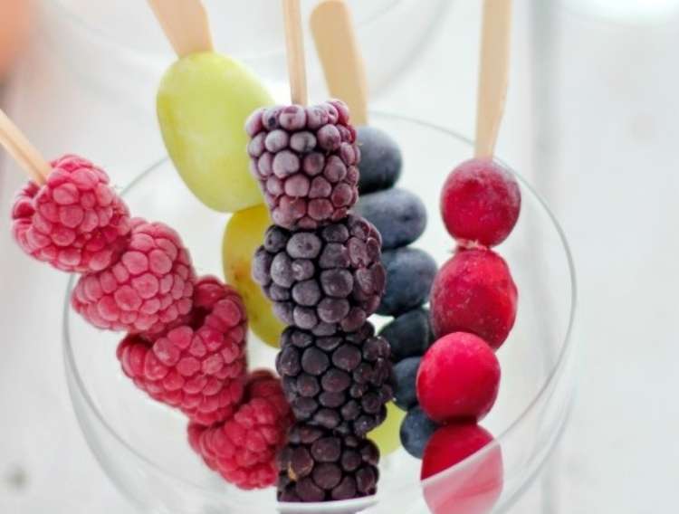 OneCrazyHouse Party Foods cup filled with fruits on a stick for drinks