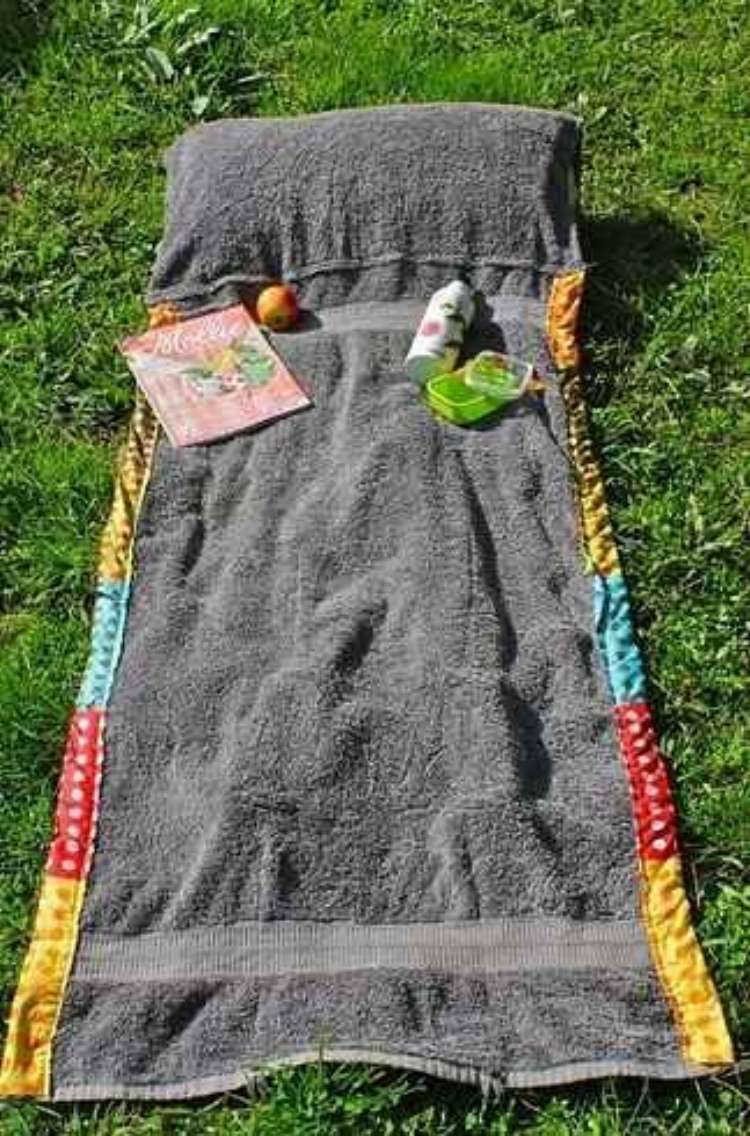 OneCrazyHouse pool storage DTT beach towel bag layed out as a towel on grass