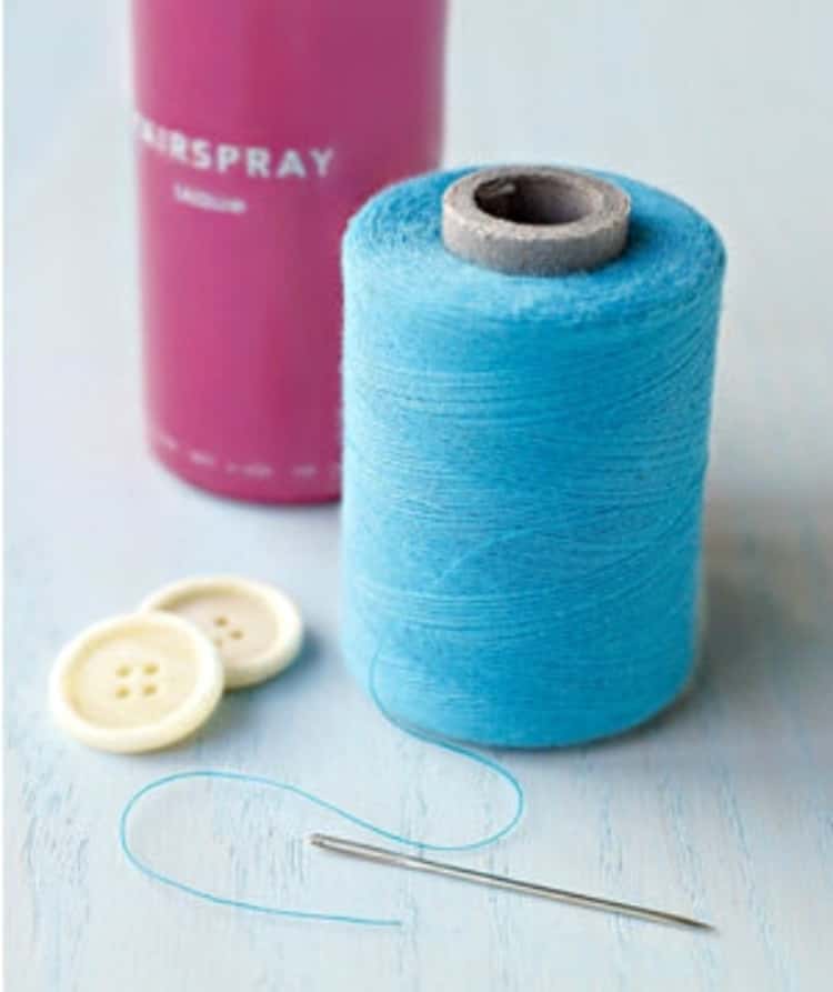 Hairspray hack to make thread go through needle eye faster