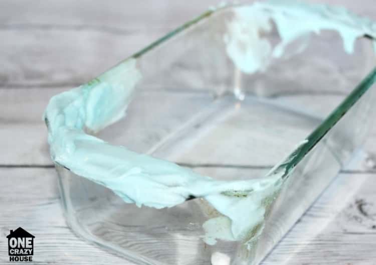 Apply dawn and baking soda paste to stains on glassware