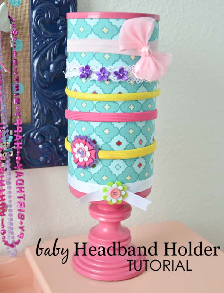 decorated oatmeal container used to hold baby headbands