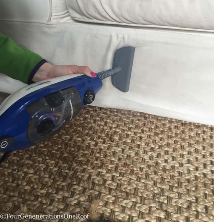 Cleaning stains off the upholstery using a steam cleaner