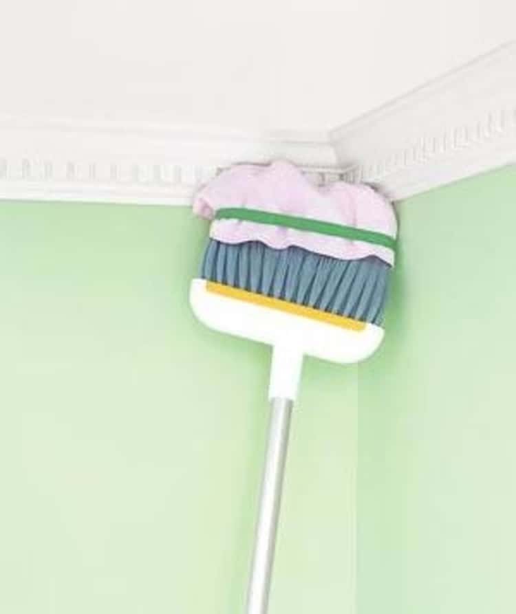 dusting hacks - microfiber cloth secured with rubber band on a broom to clean crown moldings on high ceiling g