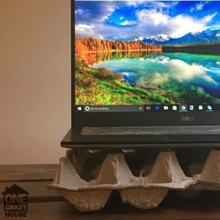 laptop placed on egg carton 
