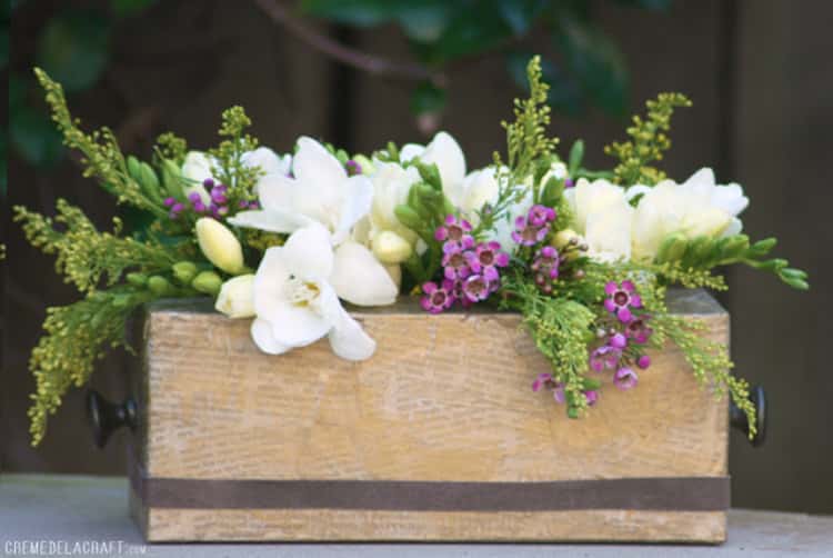 Assorted flowers in a DIY Flower Vase made from a tissue box 