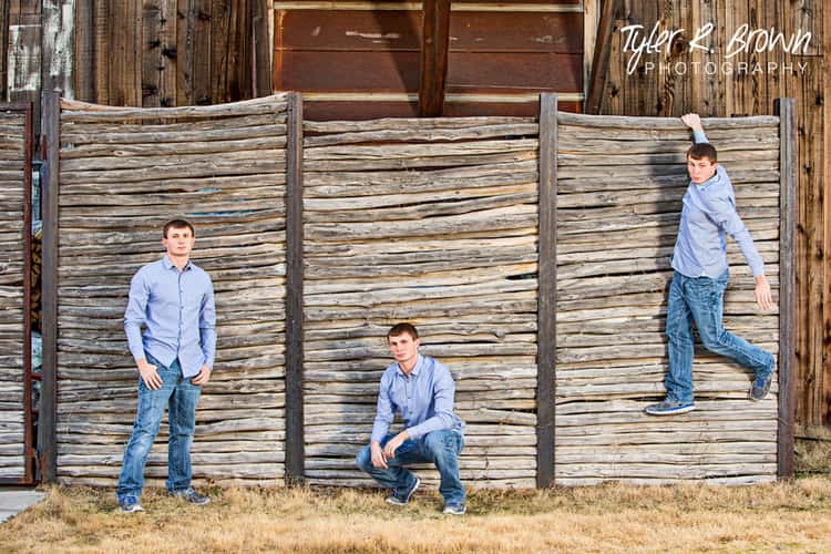 senior picture ideas for guys - image with 3 different poses of a guy posing in front of a rustic fence