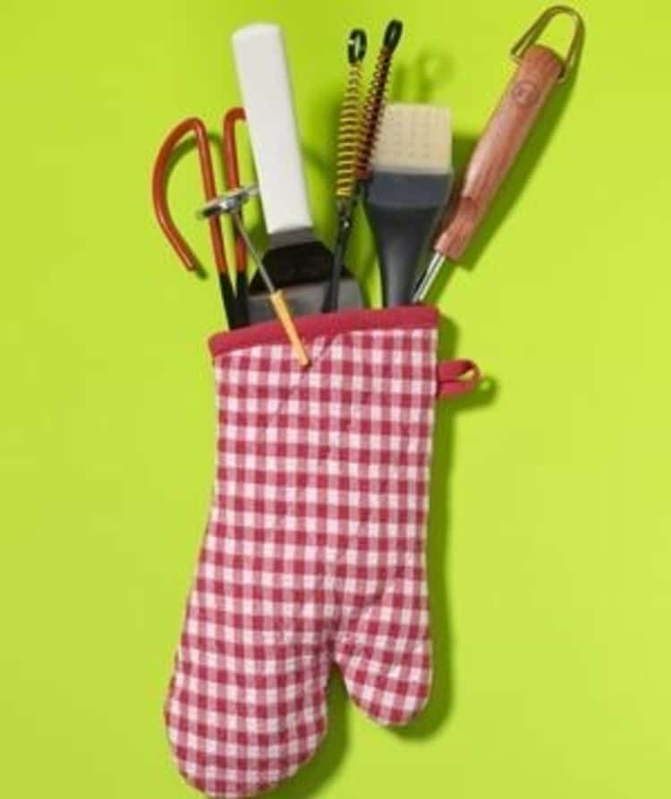 Use an oven mitt to store your grilling utensils