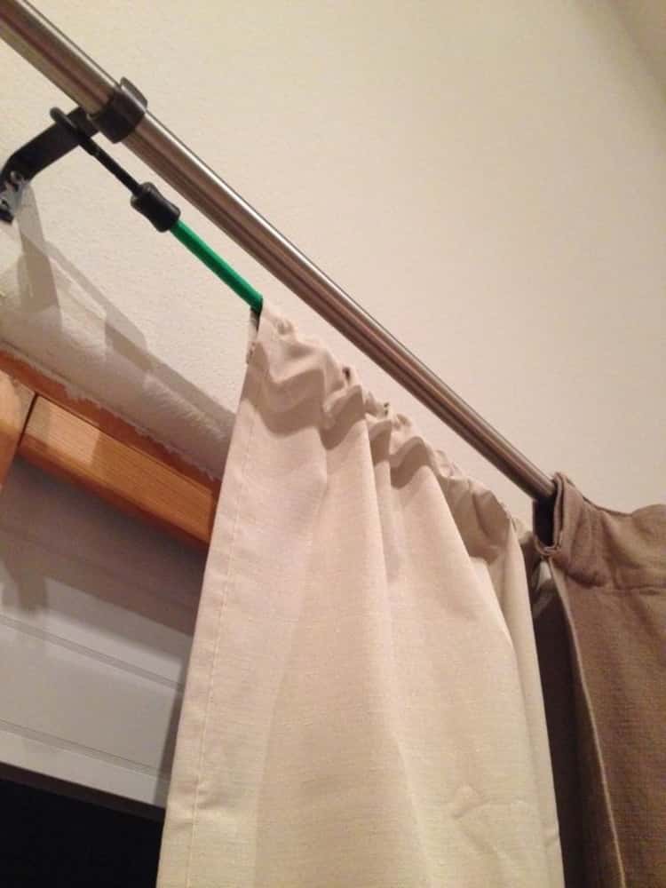 bungee cord uses - thermal curtains draped using bungee cords on existing curtain rod