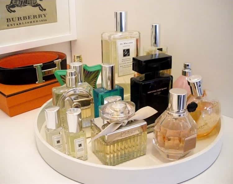 Well-organized perfume display on a Lazy Susan