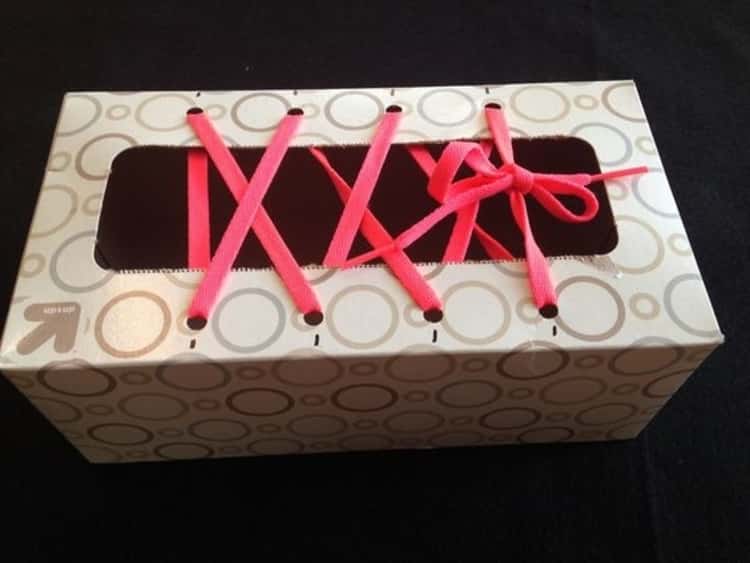 Tissue box uses - laced up tissue box 