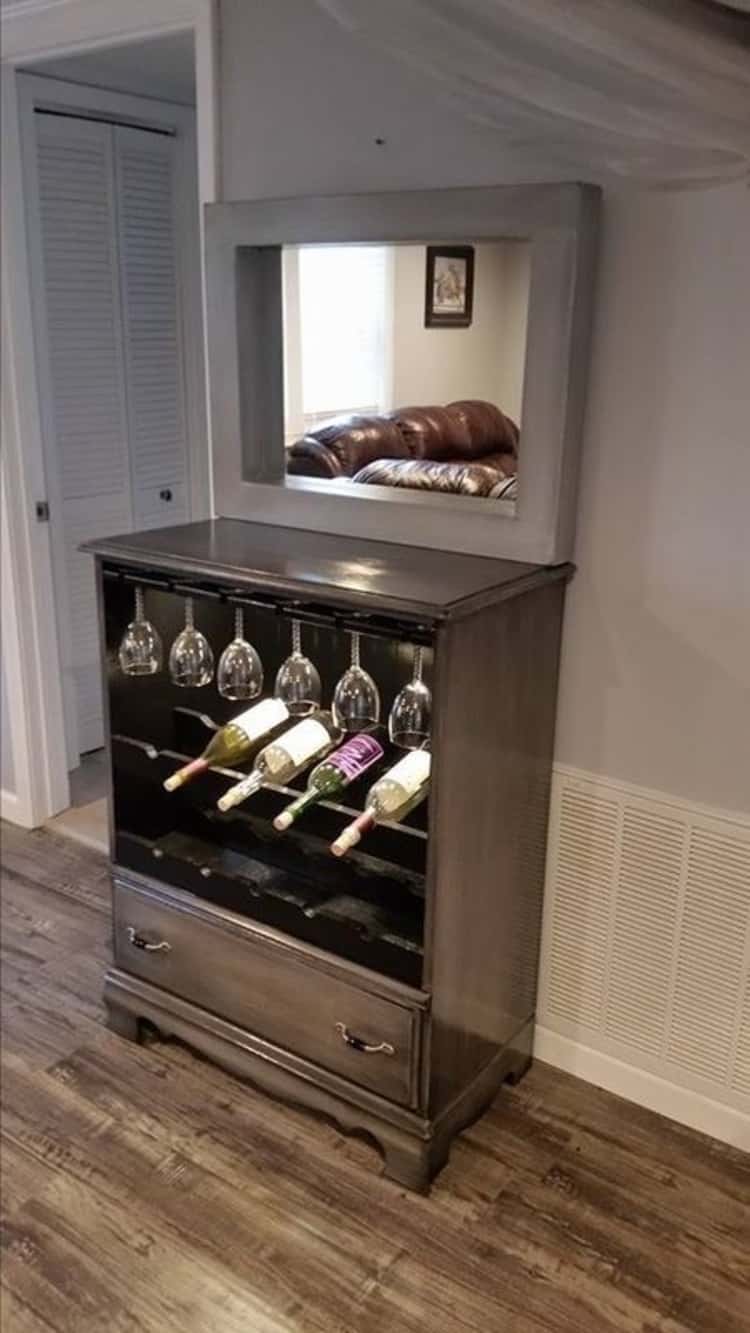 dresser made over into a lighted wine cabinet