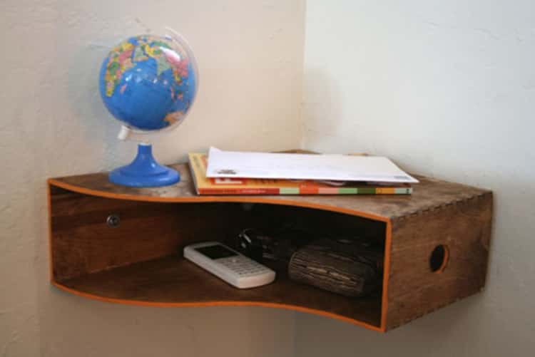DIY corner shelving made from a wooden magazine holder from IKEA