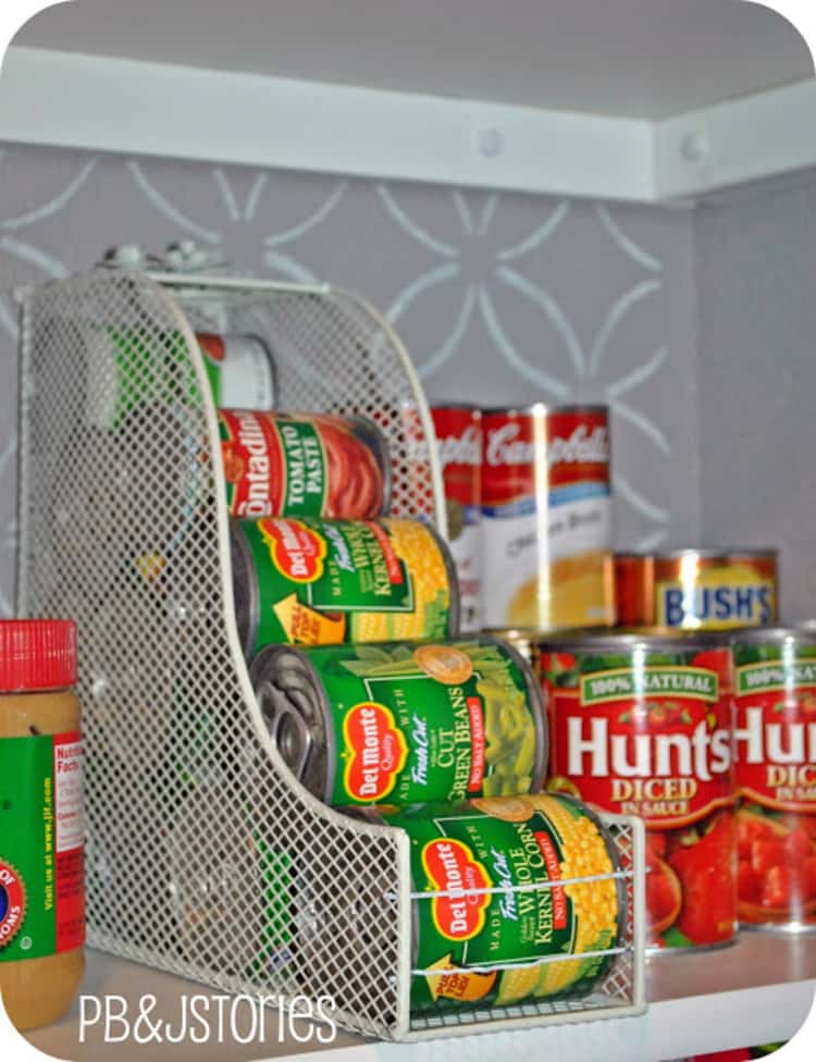 Food pantry showing a DIY mini food dispenser using a meshed magazine holder 