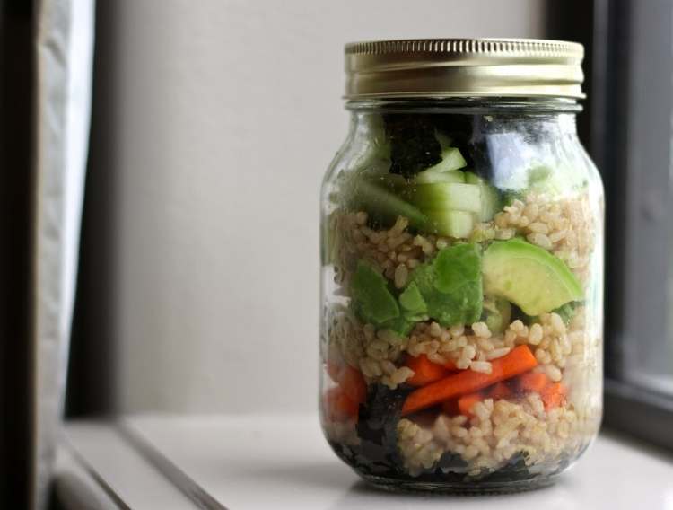 Sushi in a jar: rice, avocado, carrots, seaweed, and other veggies in a single mason jar