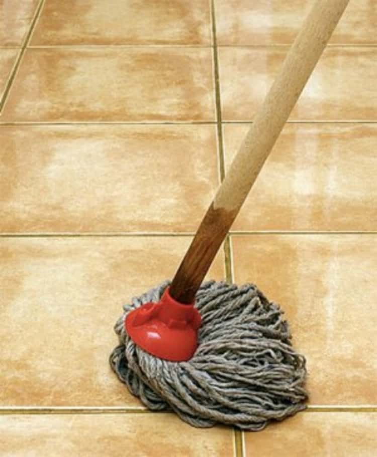 mopping tips - wet mop in use on tiled floor 