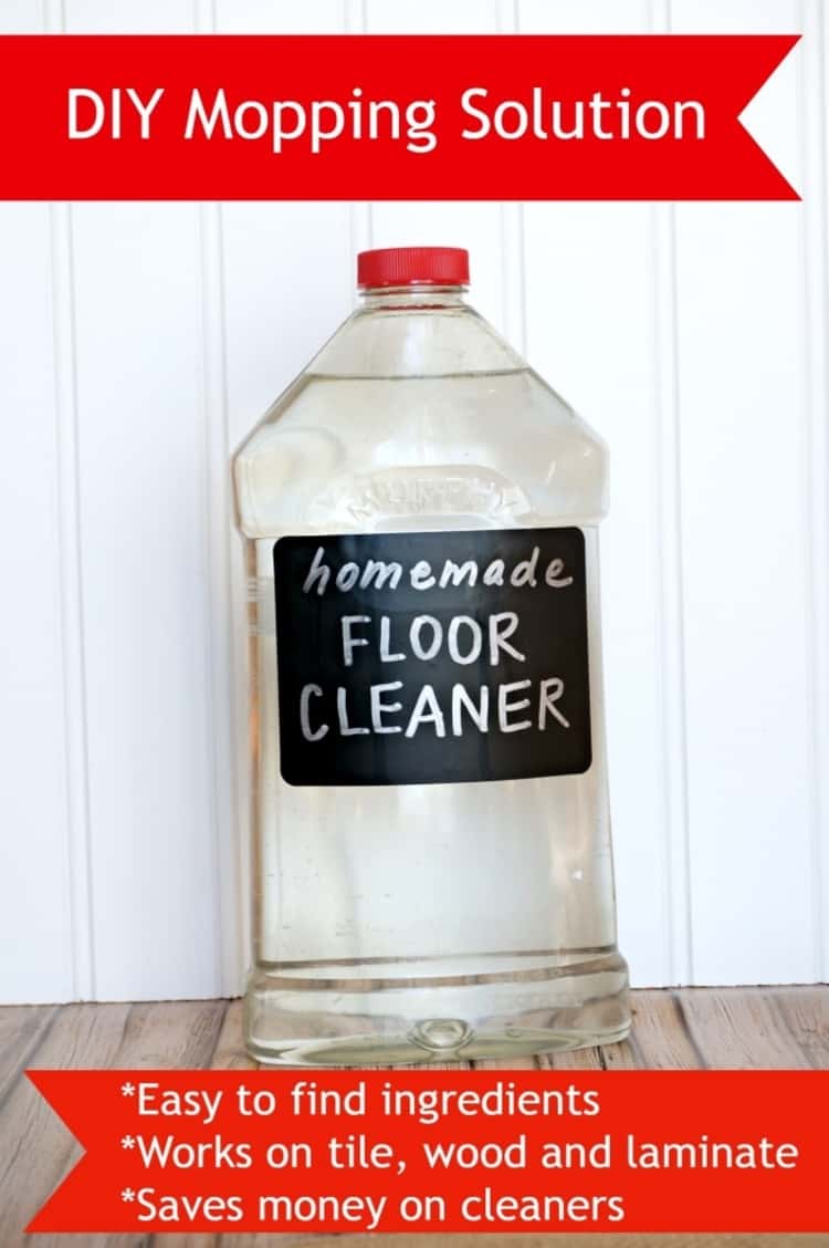 bottle of homemade floor cleaner made with easy to find ingredients, and works on tile, wood and laminate surfaces so helps save money on cleaning solutions. 