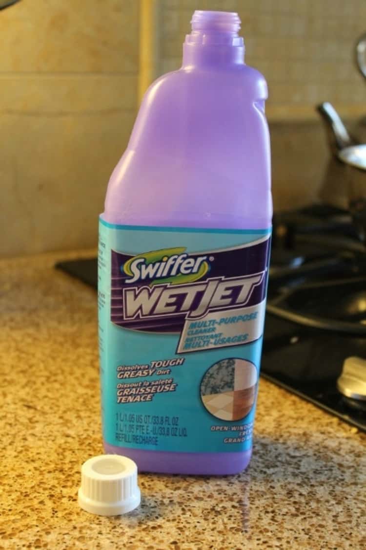 Mopping tips - Empty Swiffer WetJet Bottle with cap off and placed on the counter