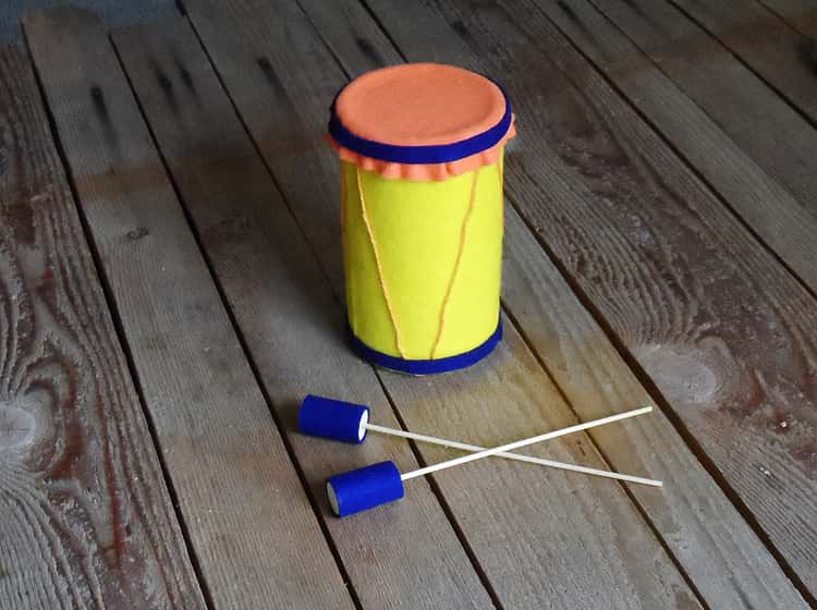 DIY oatmeal container drum with drumsticks