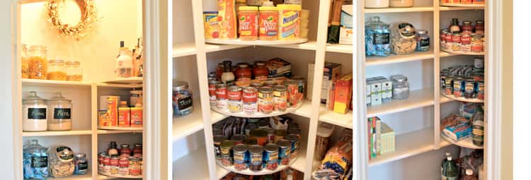  a lazy susan, floor to ceiling inside a pantry with canned goods on it