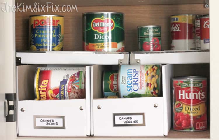 photo boxes on shelves storing canned goods