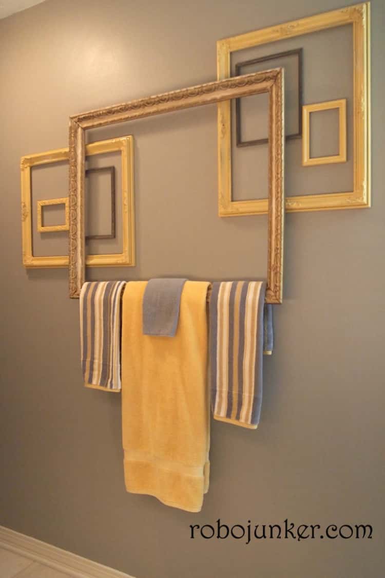 Use old photo frames as a towel holder