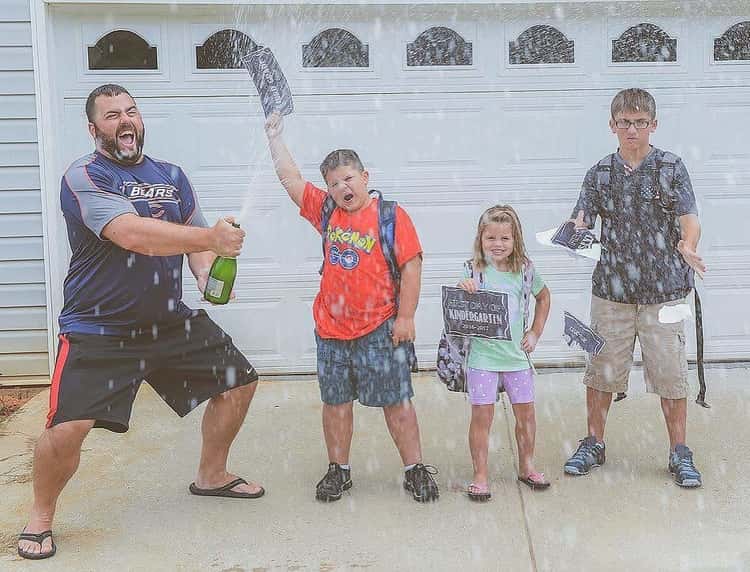 back to school photo ideas - Dad pops the bubbly while kids look on in disbelief