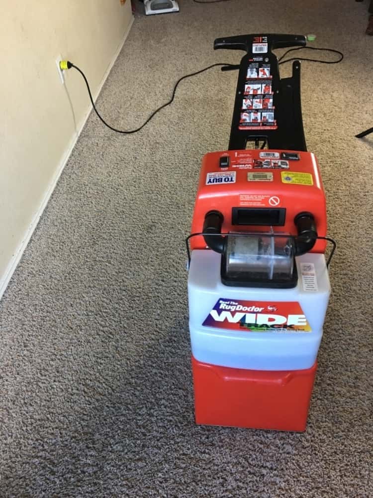 Photo showing an assembled rug doctor cleaning machine ready to clean carpets 