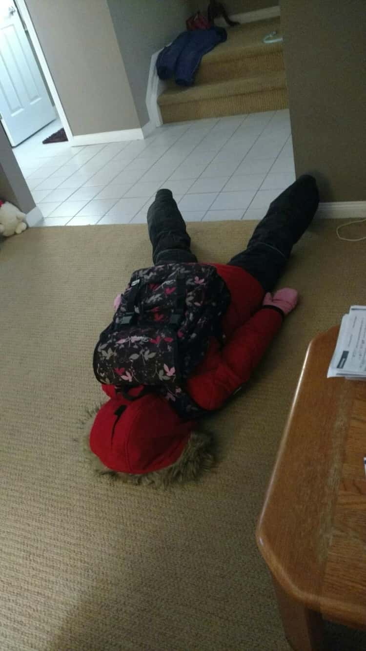 back to school photo ideas  - little girl face down on the floor in despair