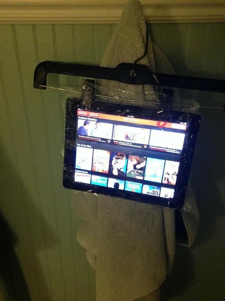 shower hacks - iPad in Ziplock bag on hanger in the shower